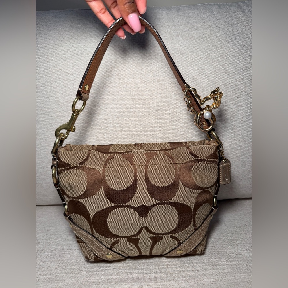 SOLD - Coach Carly
